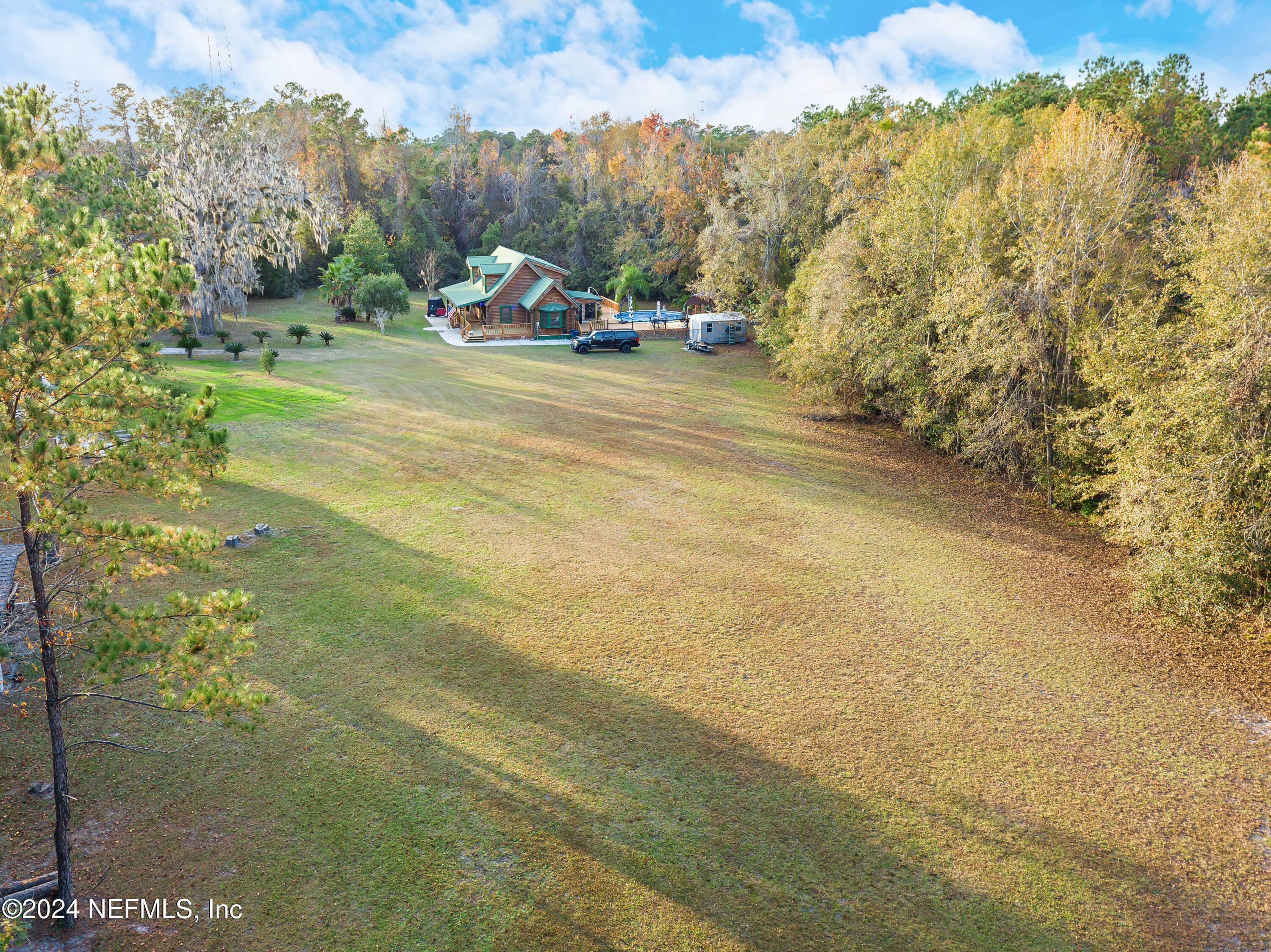 149 Rhoden Drive Macclenny, FL 32063 - Photo 58 of 63 a view of a road with yard and mountain view