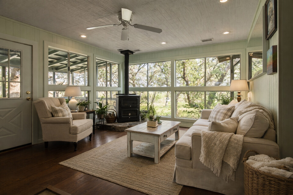 435 Spangenberg Road Blanco, TX 78606 - Photo 7 of 38 a living room with furniture and a large window
