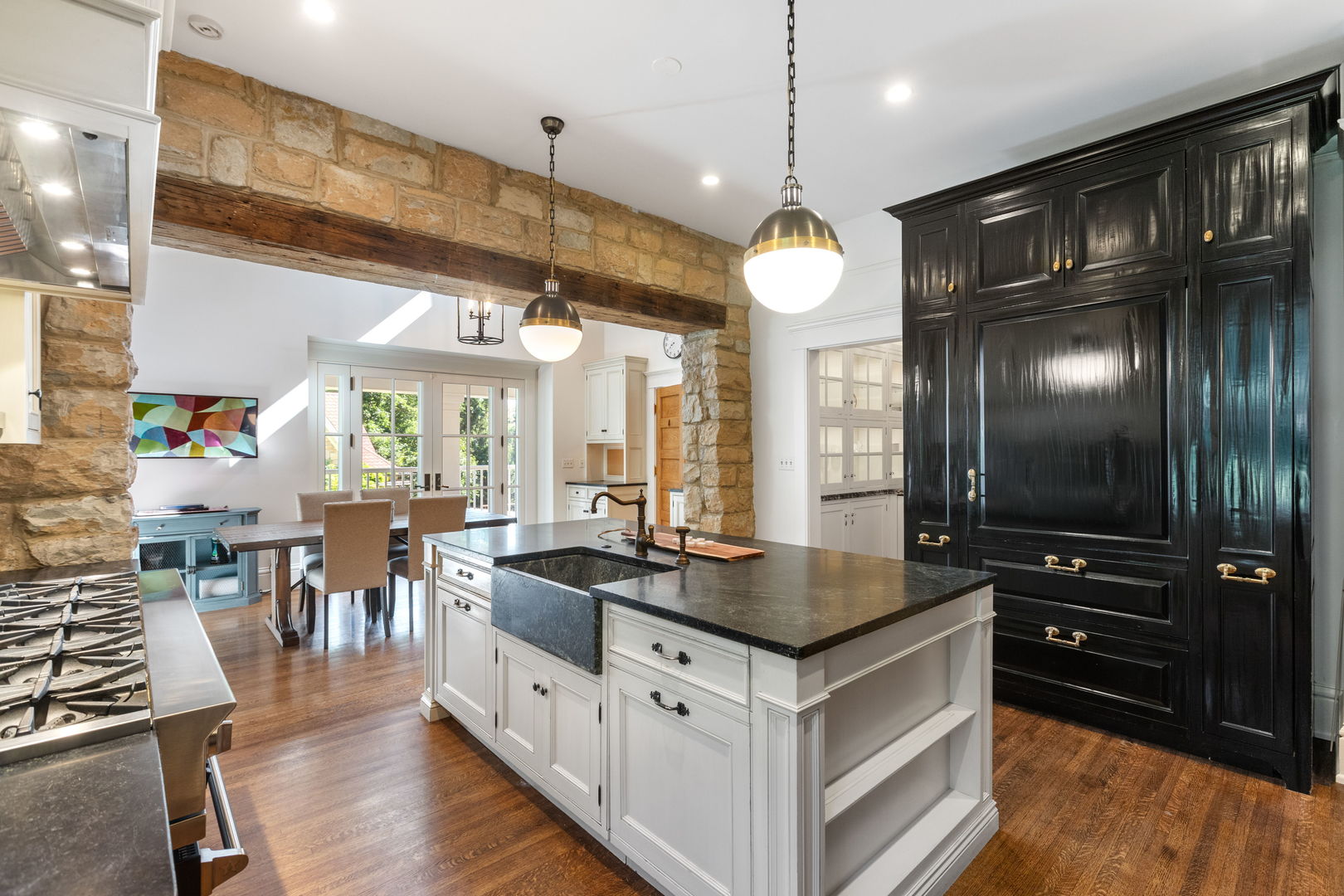 316 Elizabeth Place Geneva, IL 60134 - Photo 13 of 42 a kitchen with lots of counter space and chandelier