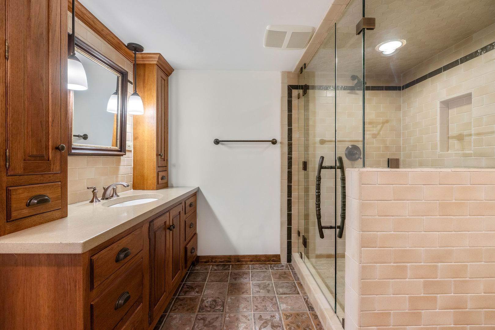 316 Elizabeth Place Geneva, IL 60134 - Photo 34 of 42 a spacious bathroom with a double vanity sink a mirror and a shower