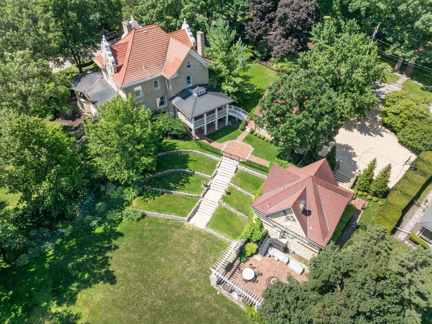 316 Elizabeth Place Geneva, IL 60134 - Photo 4 of 42 an aerial view of a house with a yard and swimming pool