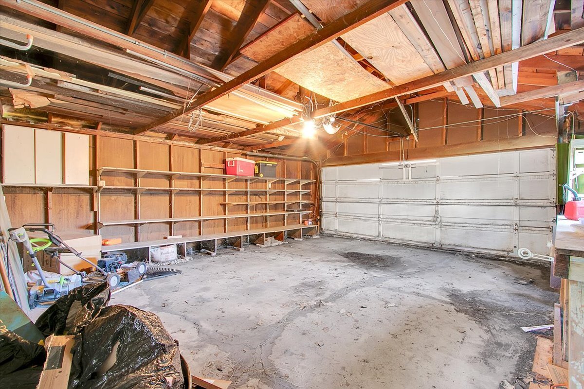 703 Oakland Avenue Joliet, IL 60435 - Photo 11 of 13 a view of a garage with storage
