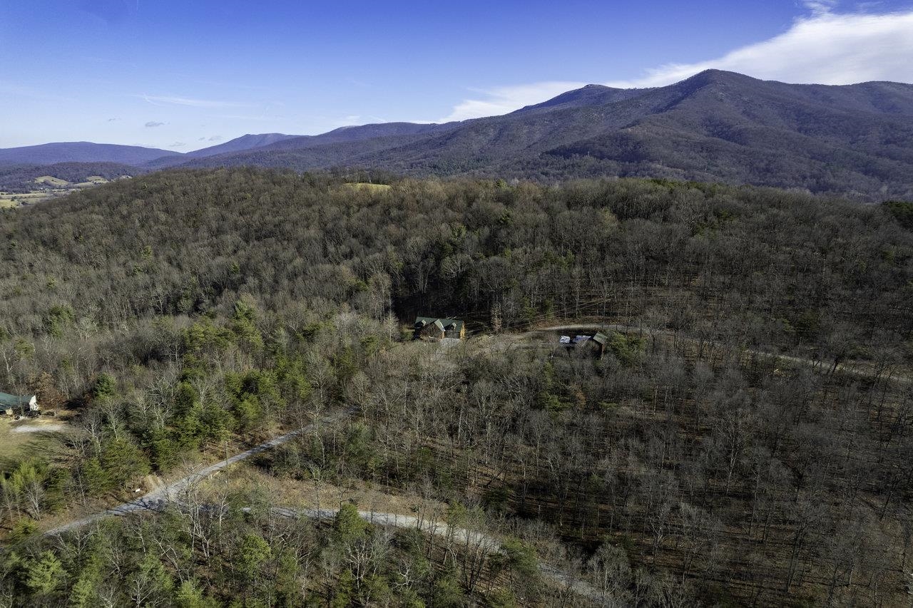 0 Holliday Hill Road Luray, VA 22835 - Photo 10 of 18 a view of a lush green hillside and a houses