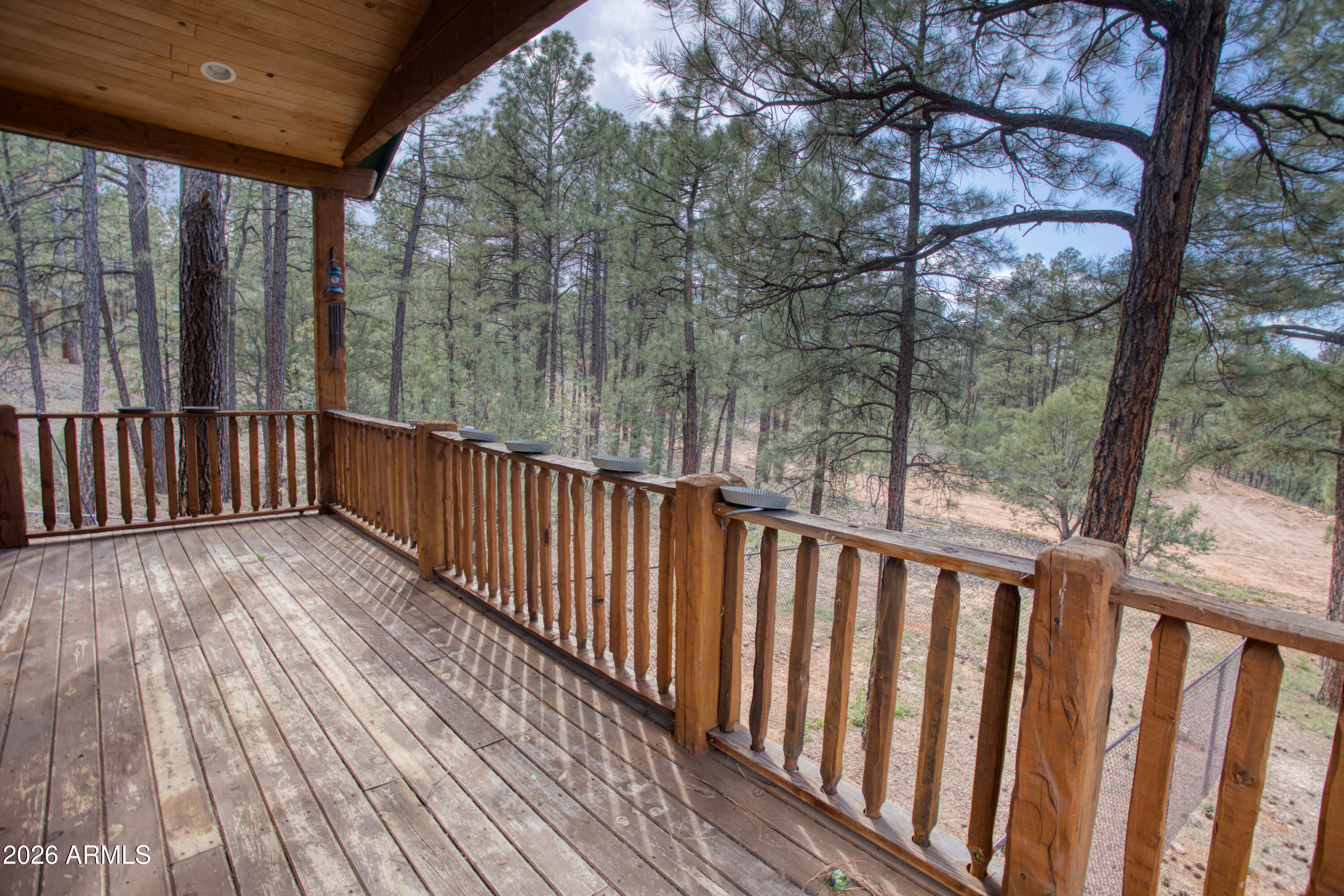 1420 Meadow View Place Show Low, AZ 85901 - Photo 14 of 25 a view of balcony with wooden floor