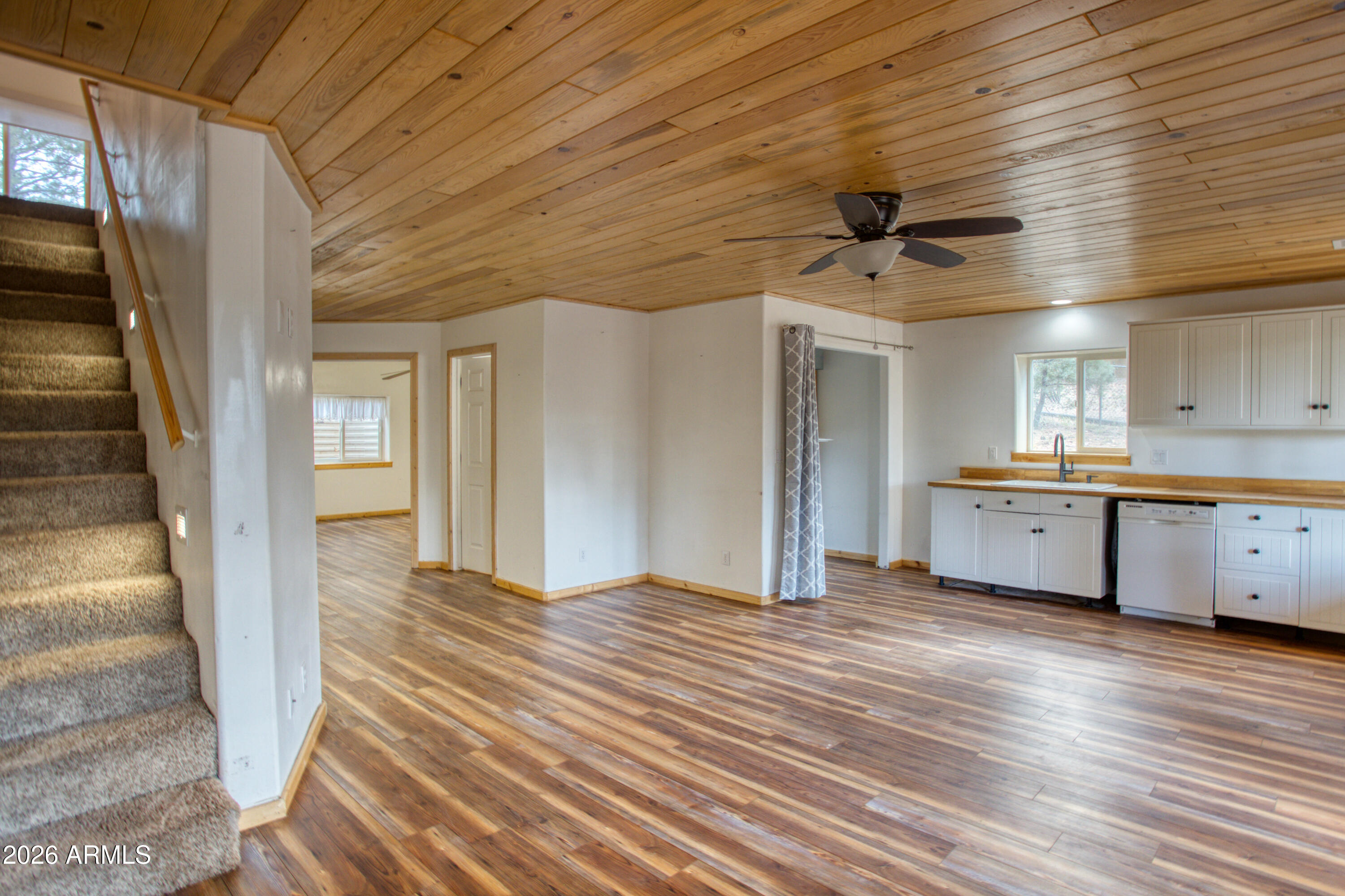 1420 Meadow View Place Show Low, AZ 85901 - Photo 16 of 25 a view of a kitchen with a sink and a refrigerator