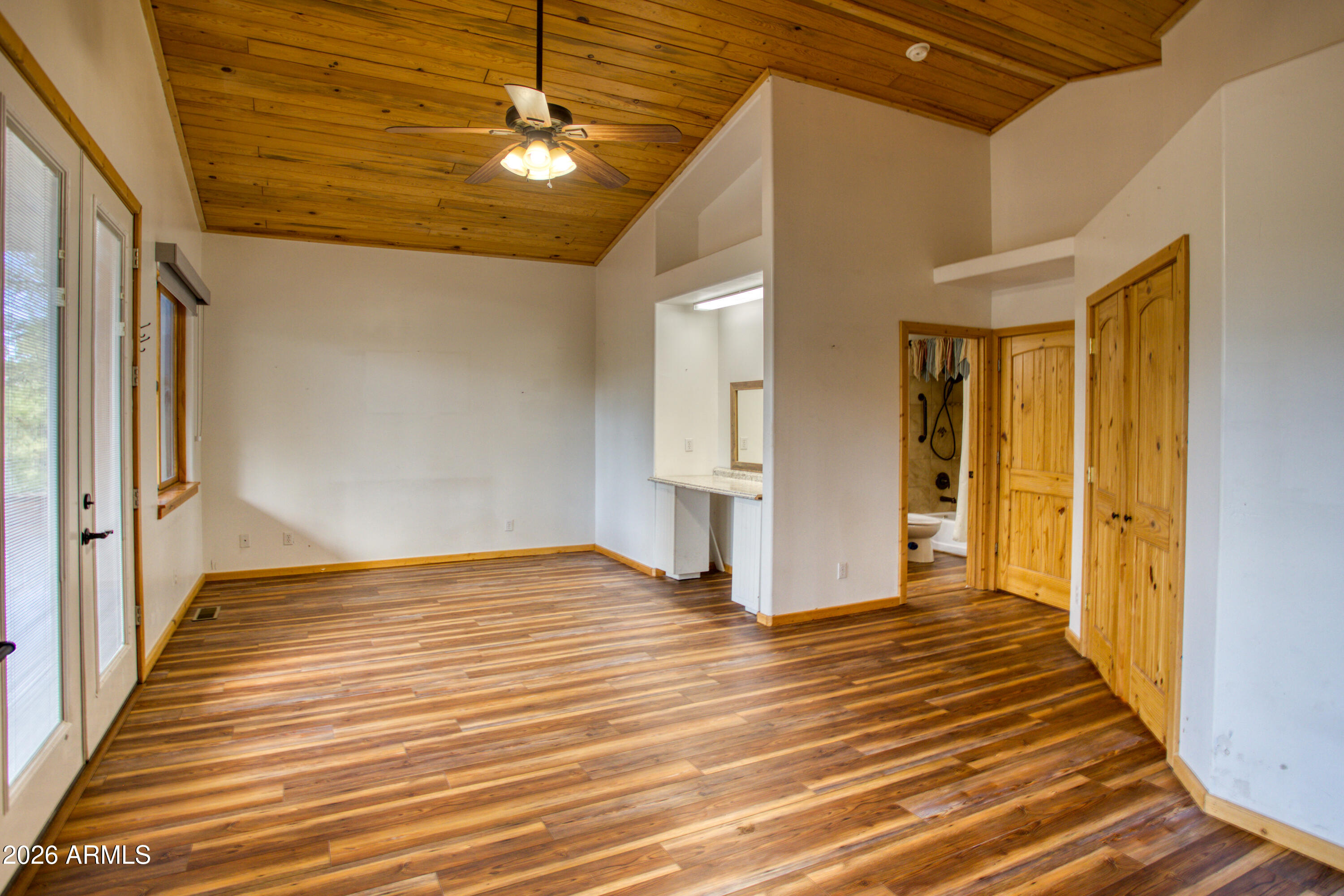 1420 Meadow View Place Show Low, AZ 85901 - Photo 10 of 25 a view of a livingroom with wooden floor
