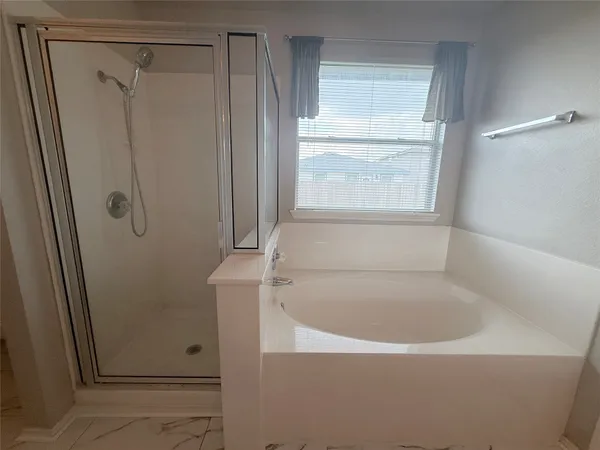 a bathroom with a bathtub