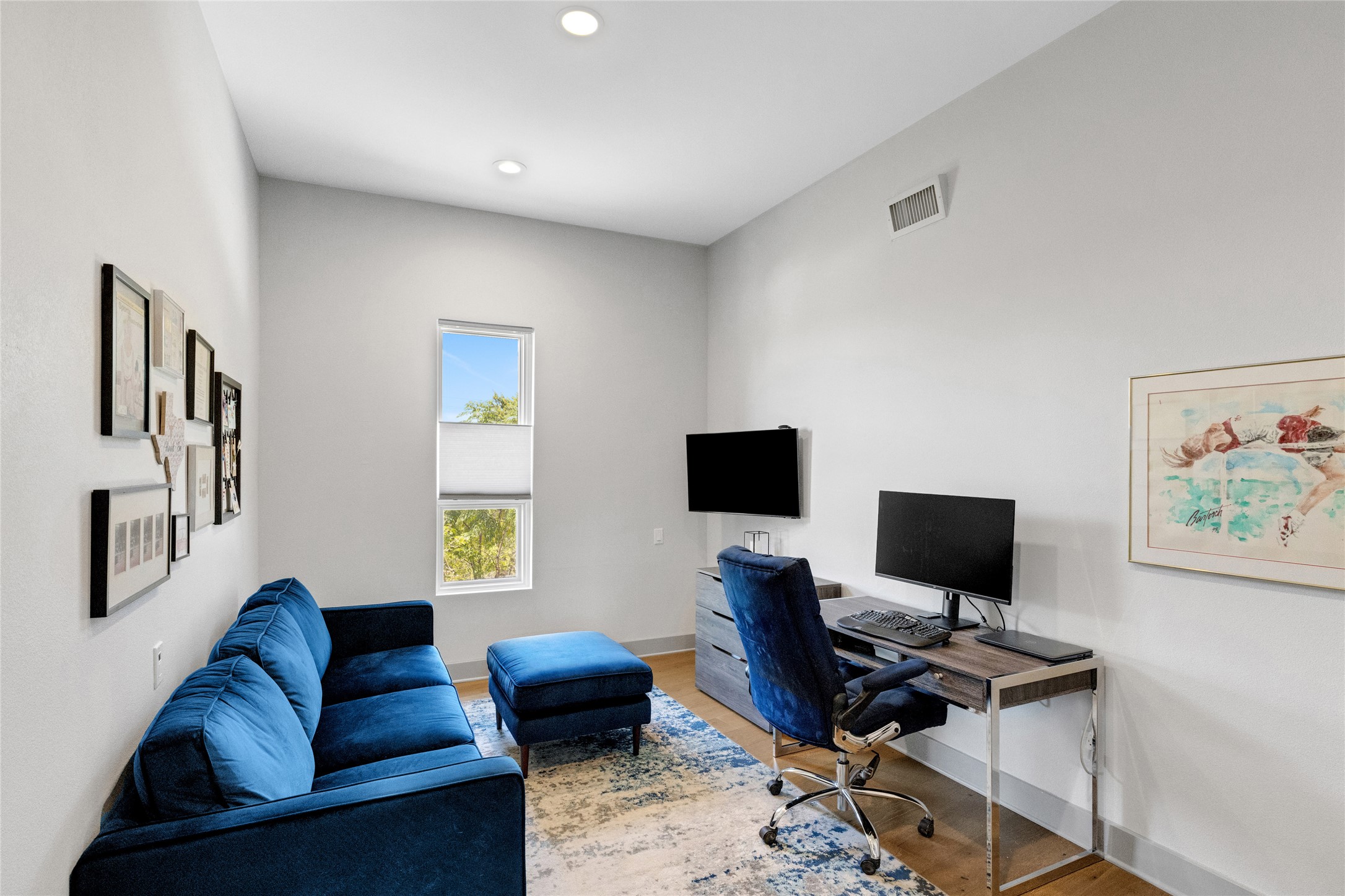 4227 Eck Lane Austin, TX 78734 - Photo 17 of 30 Home office featuring recessed lighting and wood finished floors
