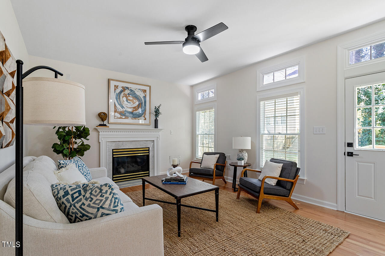 9004 Admaston Drive Raleigh, NC 27613 - Photo 9 of 30 This cozy family room makes a great place to gather around the fire during the winter.