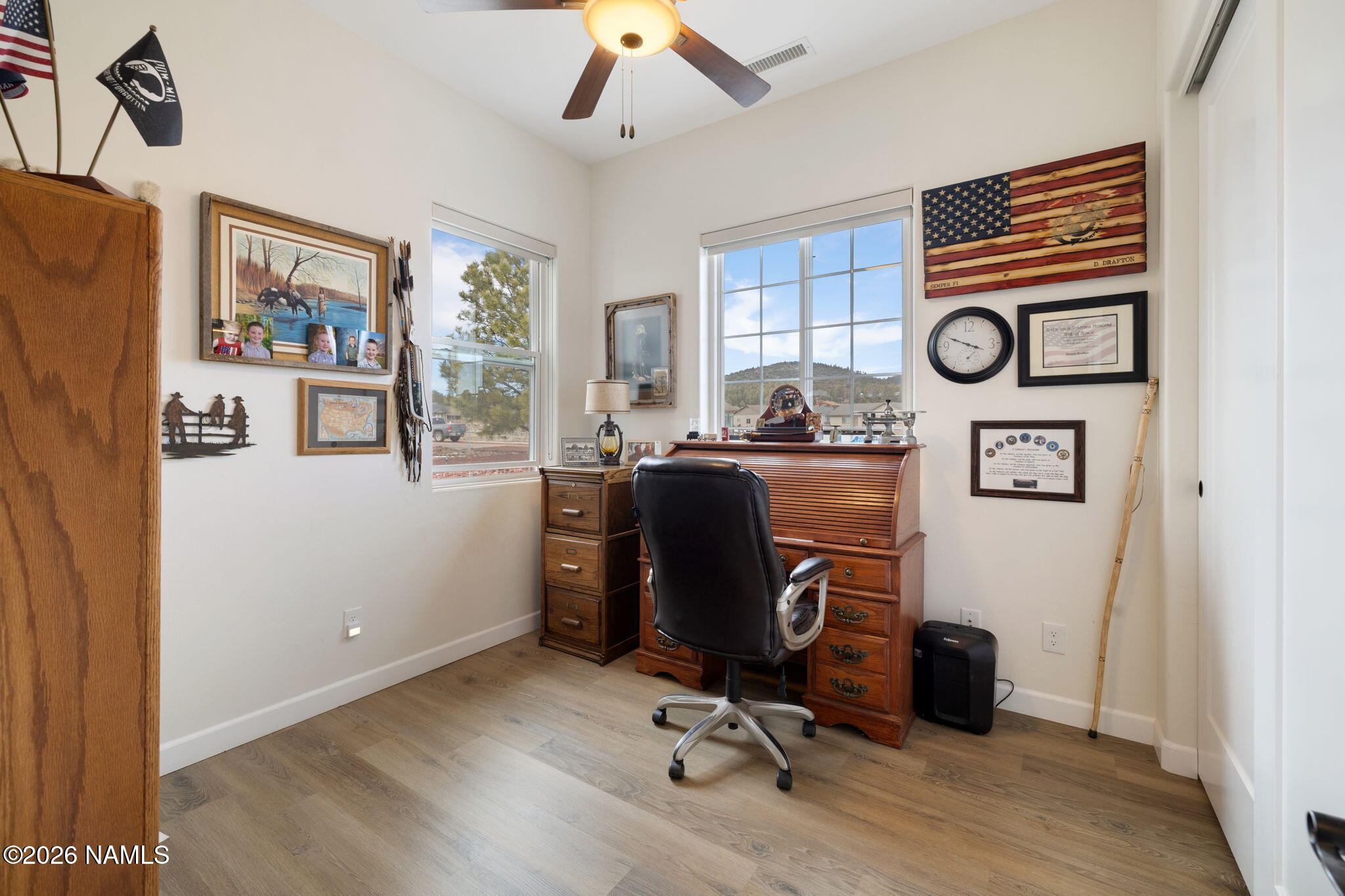 2557 Lazy E Road Williams, AZ 86046 - Photo 24 of 51 a view of a workspace with furniture and a window