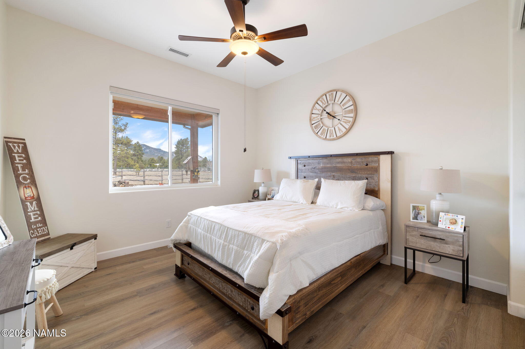 2557 Lazy E Road Williams, AZ 86046 - Photo 25 of 51 a bedroom with a bed and a window