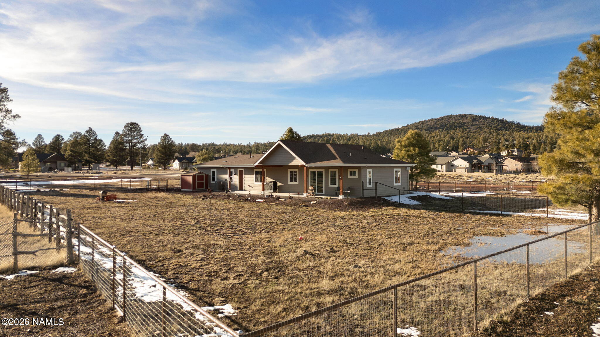 2557 Lazy E Road Williams, AZ 86046 - Photo 38 of 51 a front view of a house with a yard