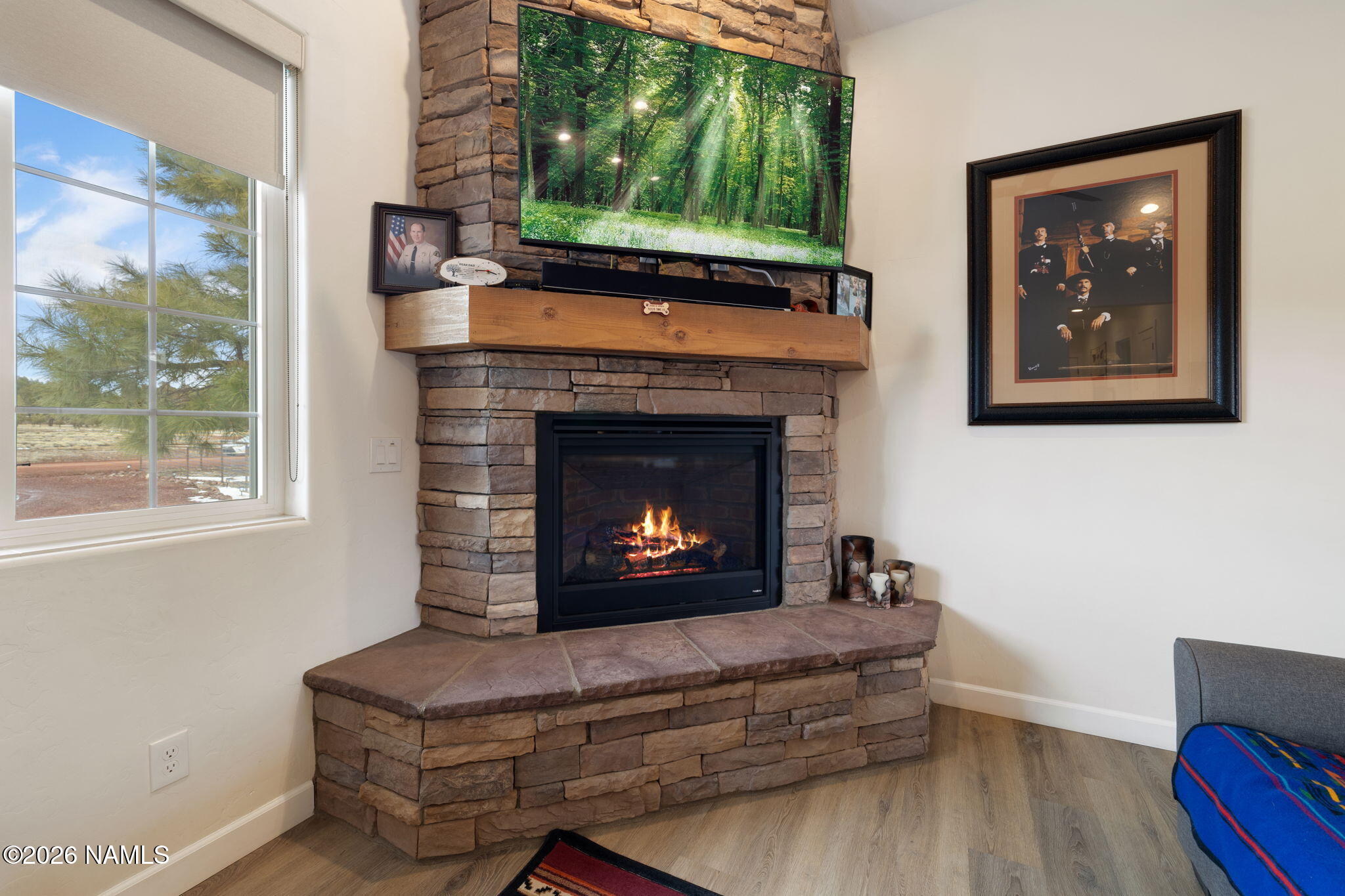2557 Lazy E Road Williams, AZ 86046 - Photo 7 of 51 a living room with furniture and a fireplace