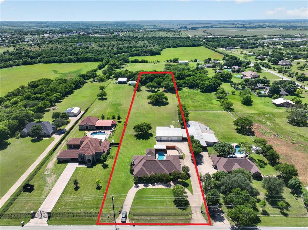 1408 West Cleburne Road Crowley, TX 76036 - Photo 2 of 40 an aerial view of a city