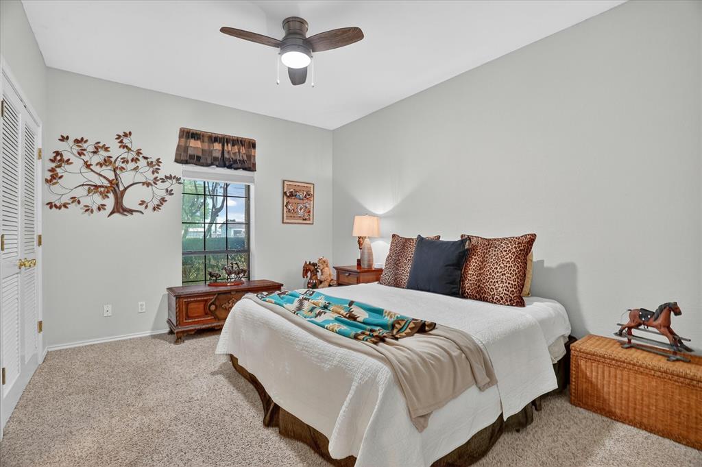 1408 West Cleburne Road Crowley, TX 76036 - Photo 23 of 40 a bedroom with bed and window