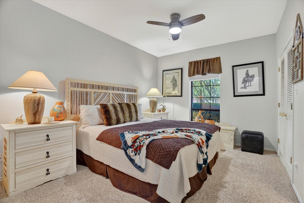 1408 West Cleburne Road Crowley, TX 76036 - Photo 24 of 40 a bedroom with a bed and window