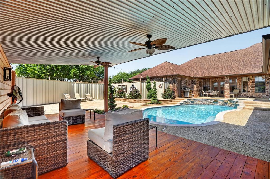 1408 West Cleburne Road Crowley, TX 76036 - Photo 4 of 40 a view of swimming pool with seating space