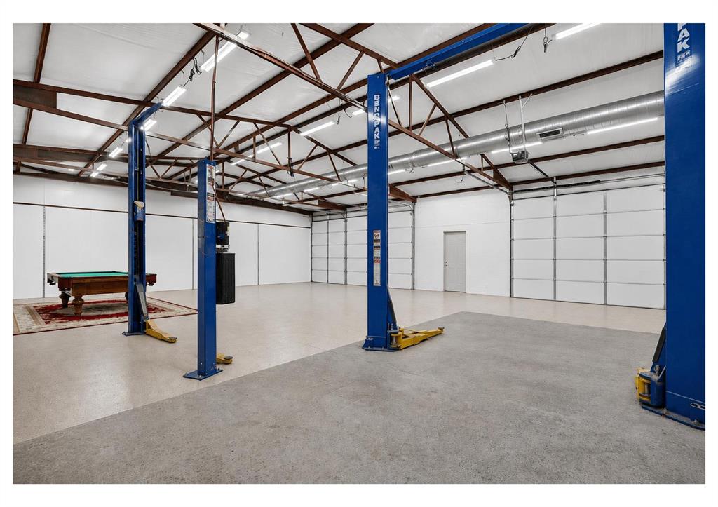 1408 West Cleburne Road Crowley, TX 76036 - Photo 6 of 40 a view of a room with gym equipment