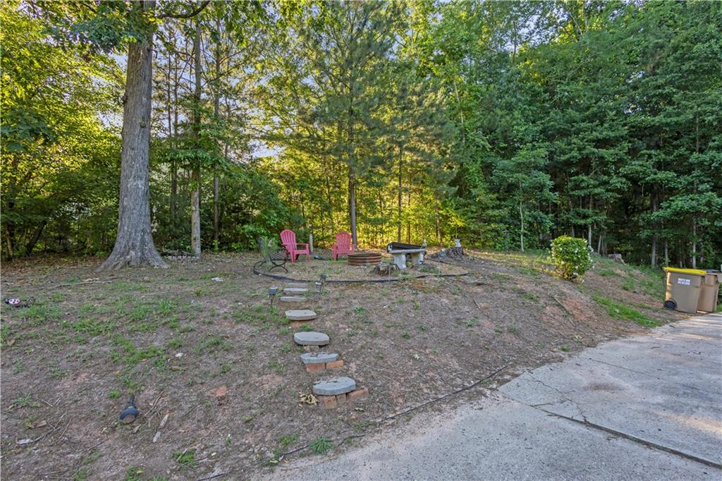 151 Dumar Lane Hoschton, GA 30548 - Photo 8 of 10 a view of some space with large trees
