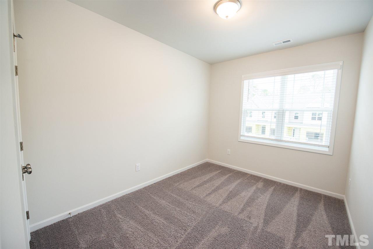 3631 Water Mist Lane, Unit 16 Raleigh, NC 27604 - Photo 16 of 28 an empty room with a window
