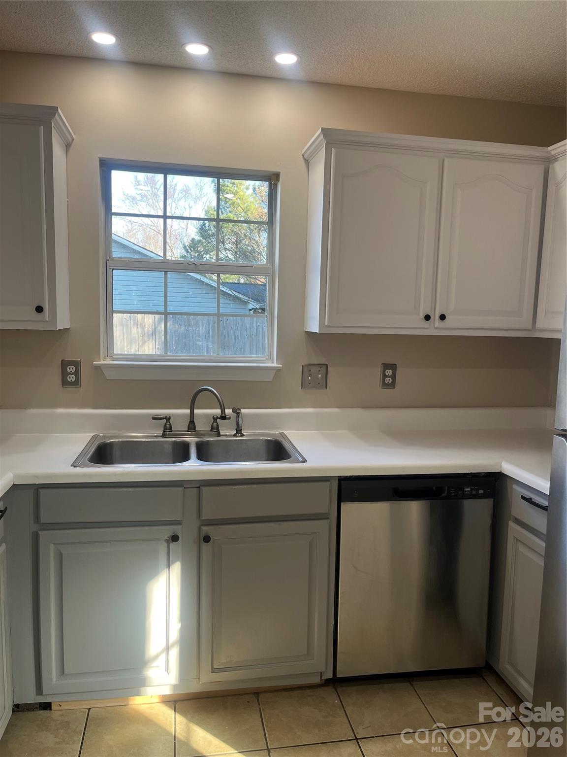 314 Tylers Way Fort Mill, SC 29715 - Photo 11 of 16 a kitchen with a sink stove and cabinets