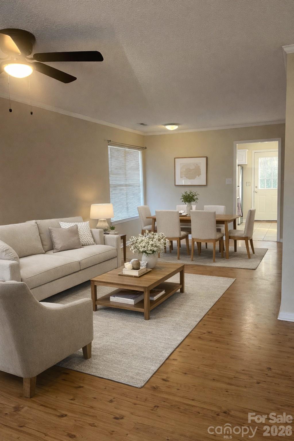 314 Tylers Way Fort Mill, SC 29715 - Photo 3 of 16 a living room with furniture and wooden floor