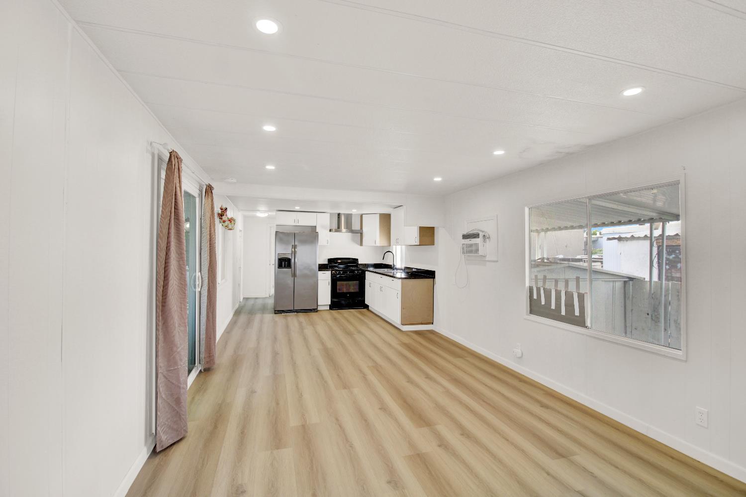 4143 Yosemite, Unit C21 Modesto, CA 95357 - Photo 15 of 25 a view of a kitchen with wooden floor