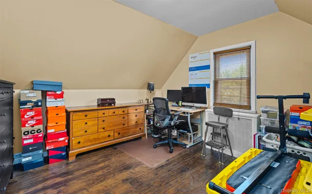 a room with furniture and a wooden floor