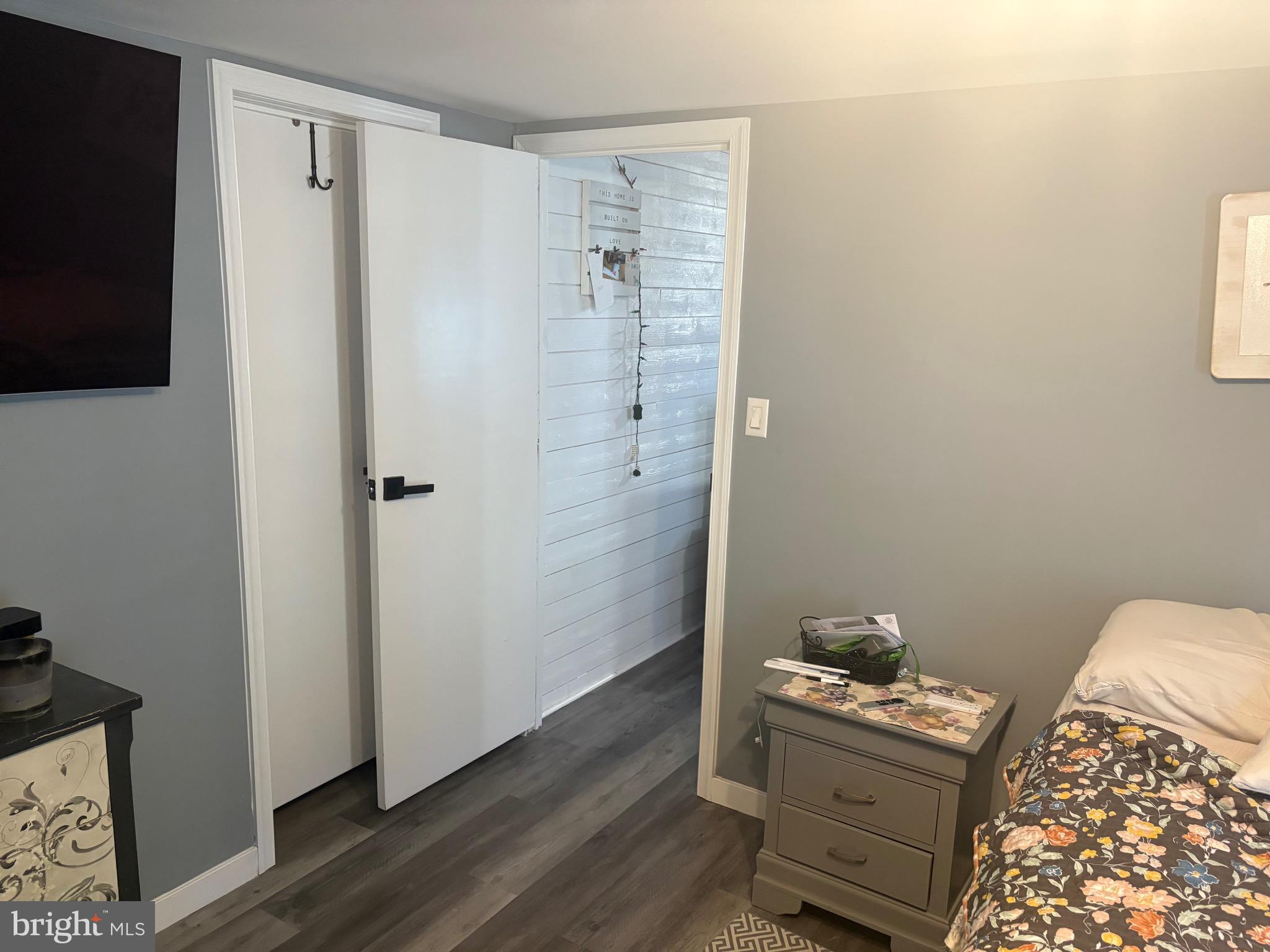 3180 Irish Hill Road Magnolia, DE 19962 - Photo 12 of 14 a room with a bed and wooden floor