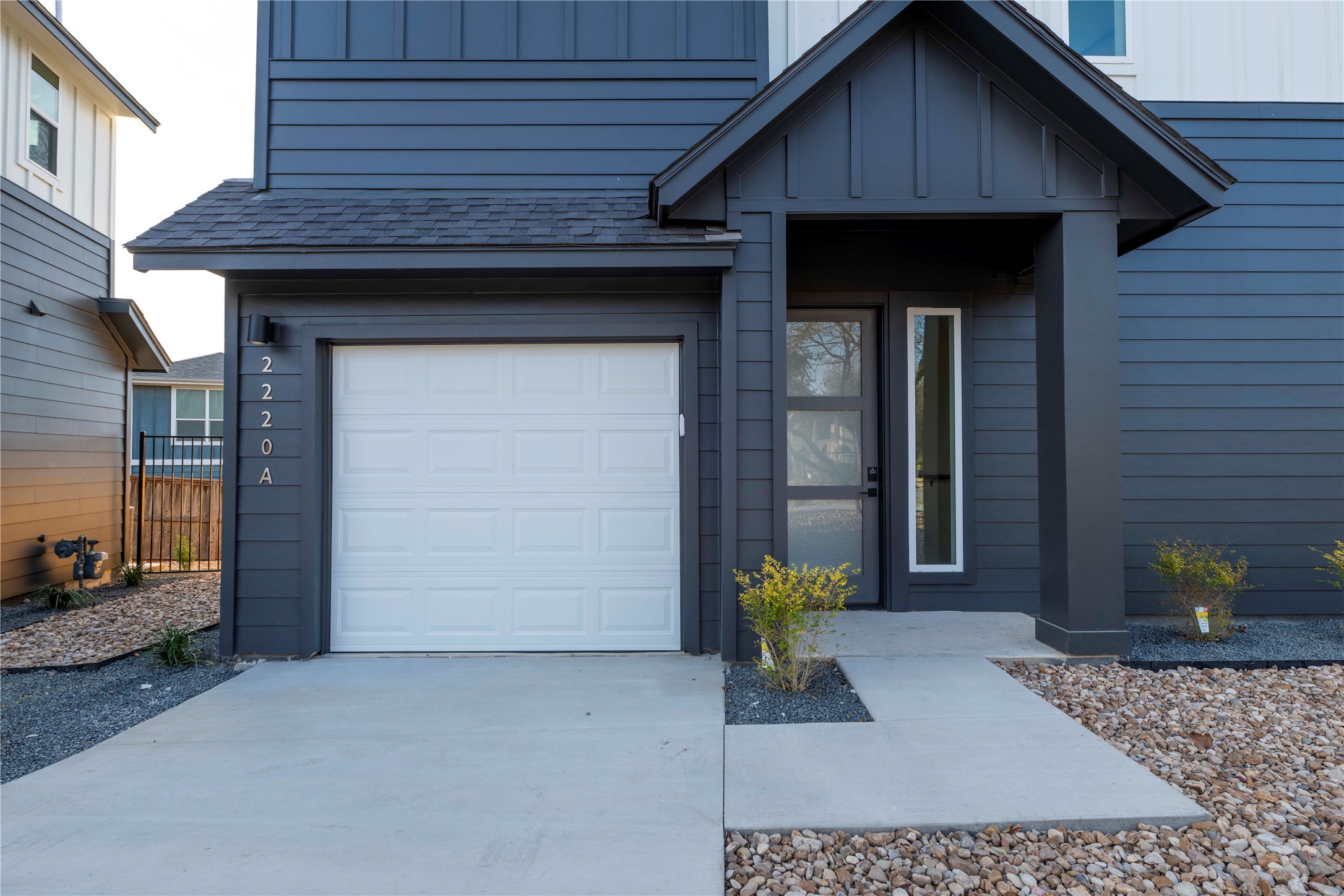 2220 Yellow Jacket Lane, Unit 1 Austin, TX 78741 - Photo 6 of 35 A modern exterior facade with sleek lines and a welcoming entryway.