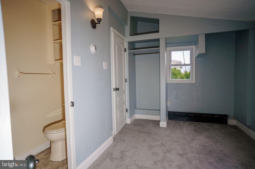 7121 Guilford Road Upper Darby, PA 19082 - Photo 9 of 24 First floor bedroom and full bathroom