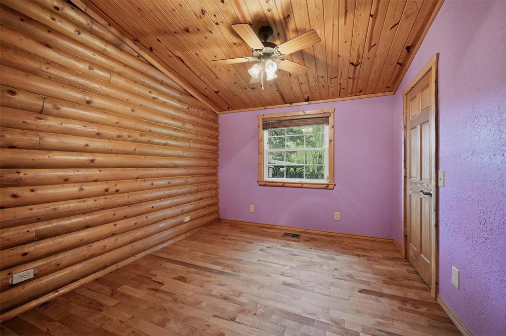 570 Ayres Road Bells, TX 75414 - Photo 20 of 40 a view of an empty room with a window