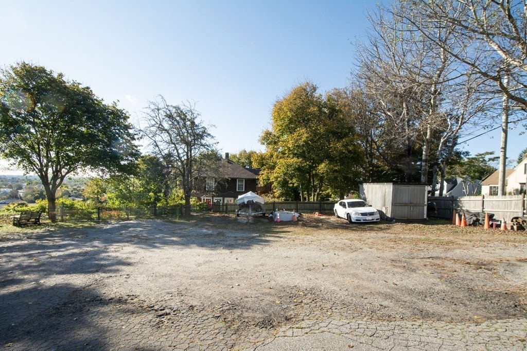 0 Prospect Avenue Hull, MA 02045 - Photo 16 of 16 a view of a fire pit with large trees