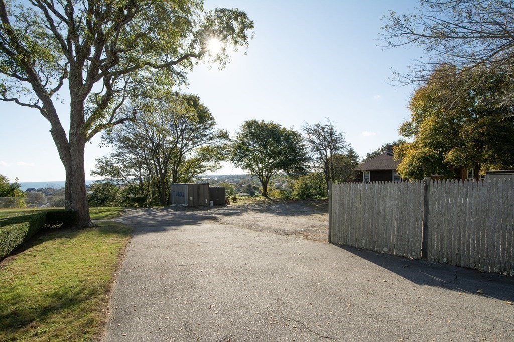 0 Prospect Avenue Hull, MA 02045 - Photo 10 of 16 a view of a yard with wooden fence