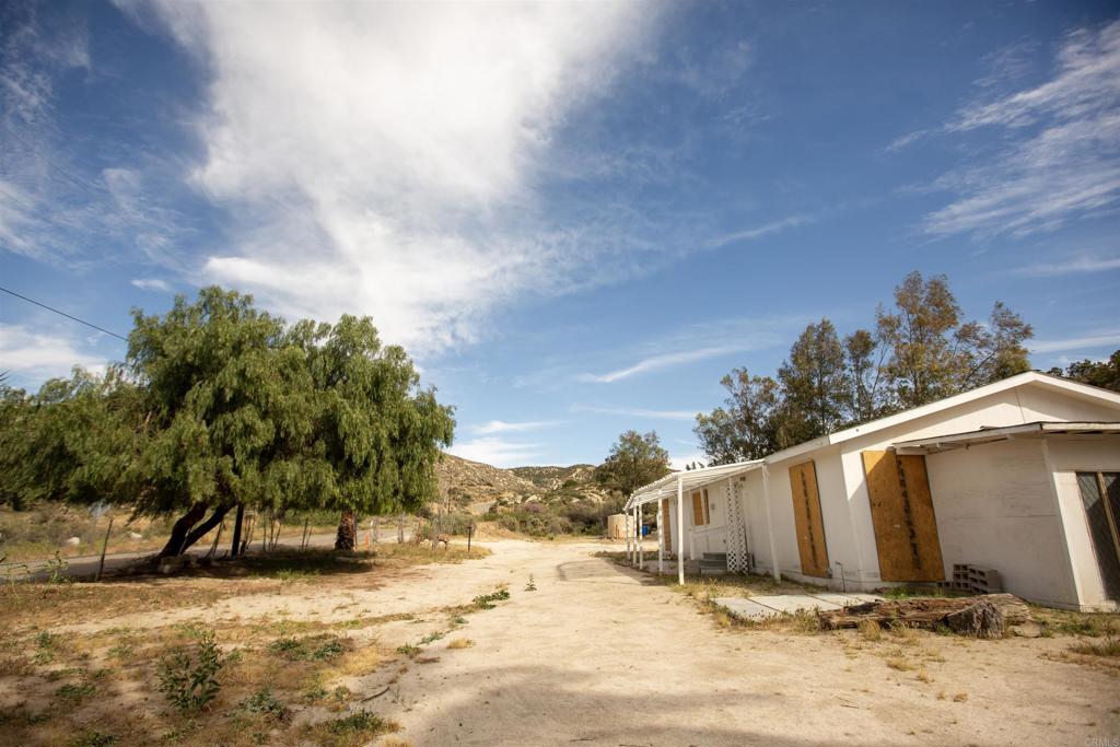 46251 Wilson Valley Road Aguanga, CA 92536 - Photo 7 of 15 a view of a house with a snow in the background