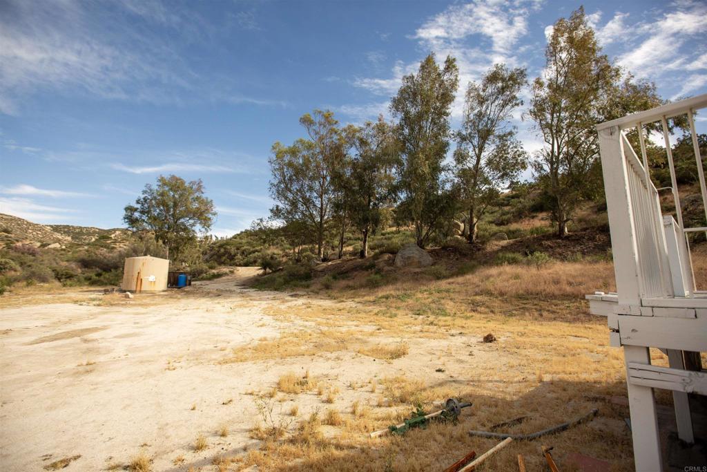 46251 Wilson Valley Road Aguanga, CA 92536 - Photo 9 of 15 a view of a yard with a tree