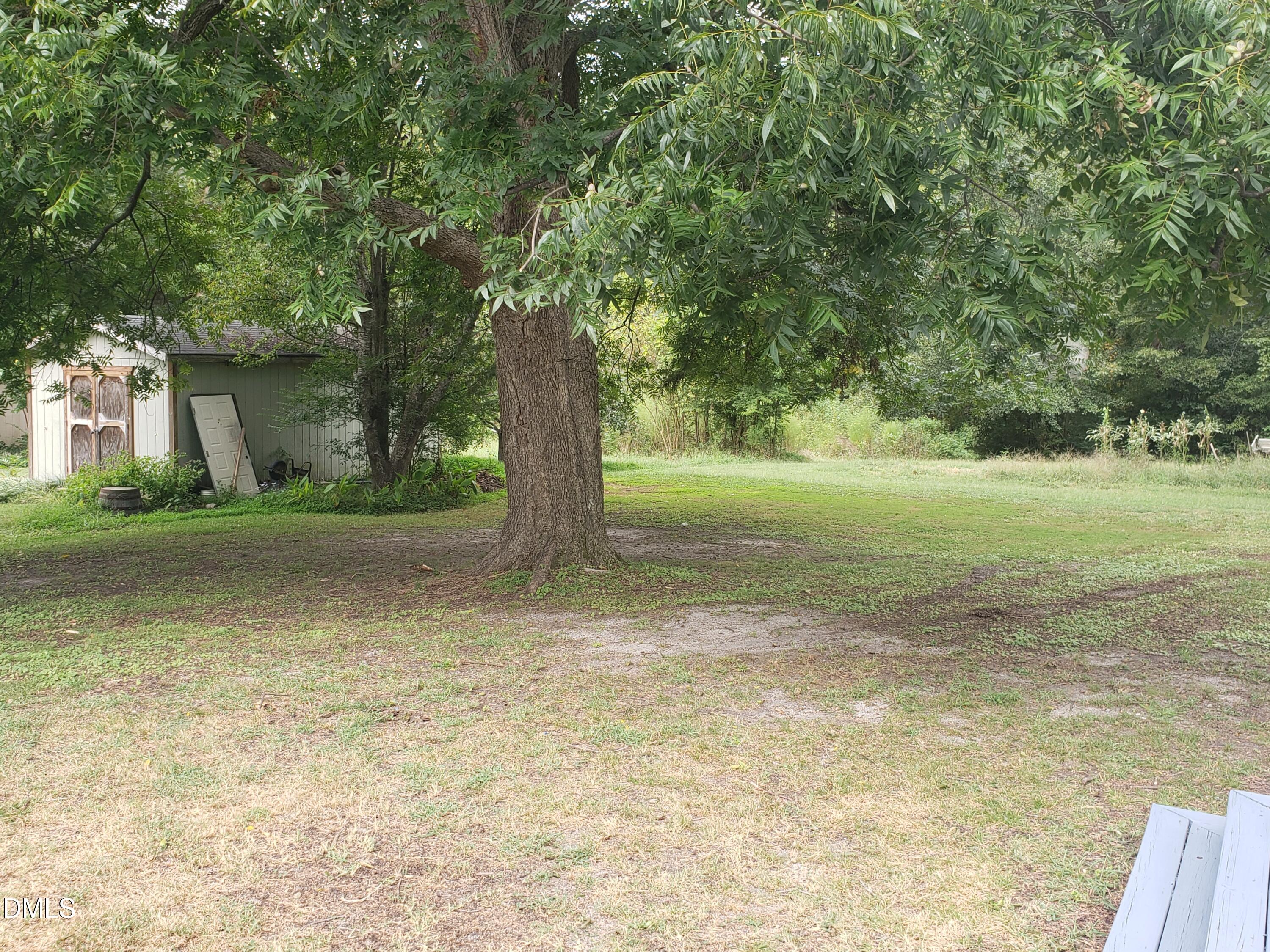 306 South Moore Street Clayton, NC 27520 - Photo 15 of 31 a view of a yard