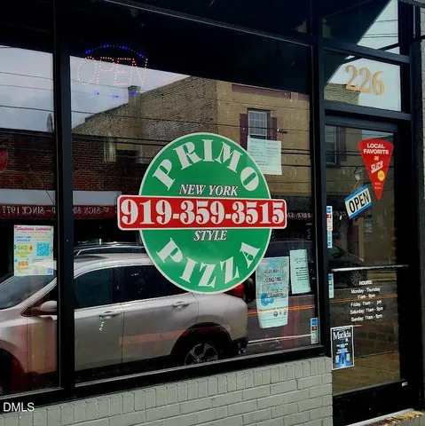 a view of outdoor space with seating area and small yard