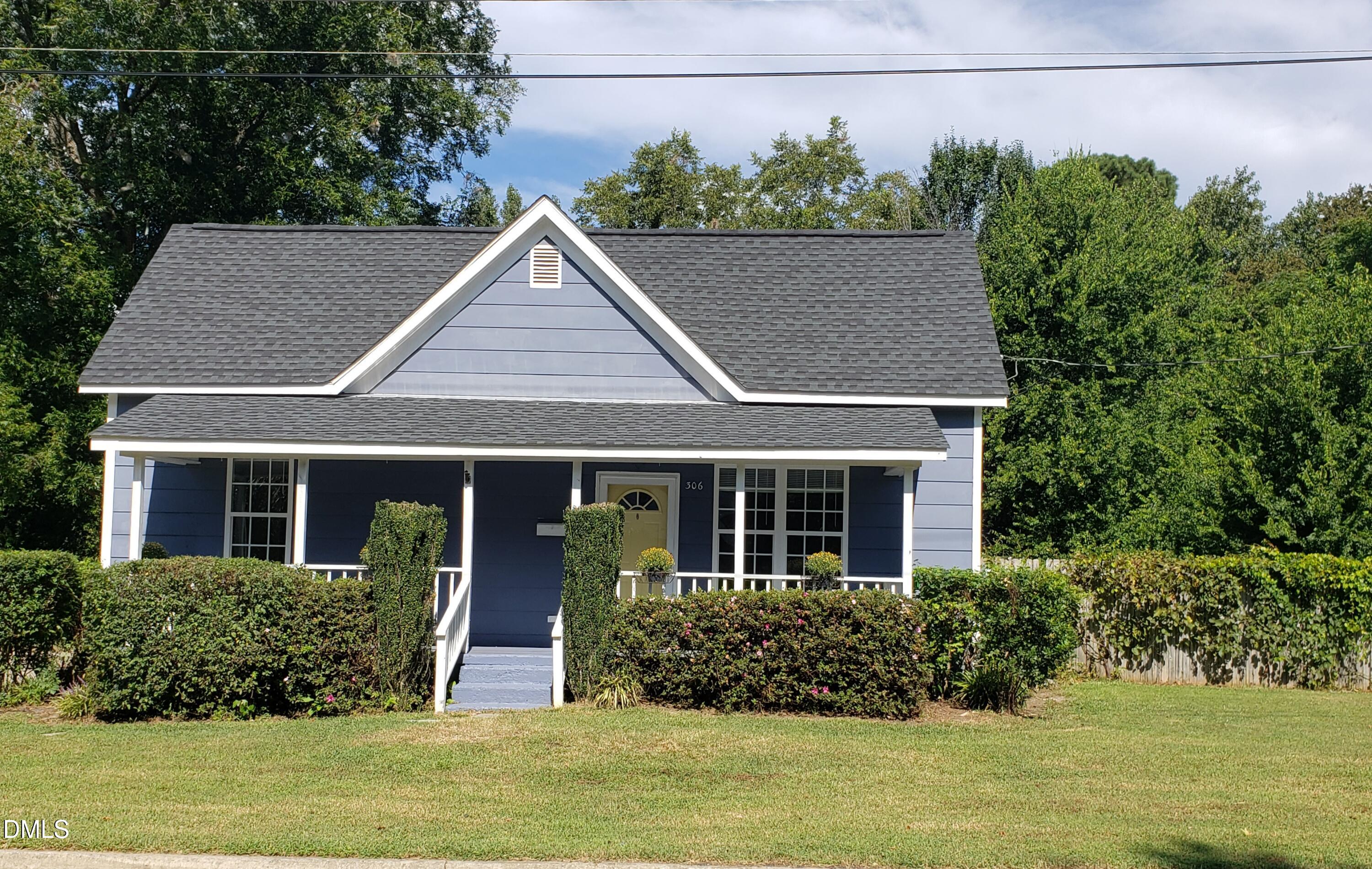306 South Moore Street Clayton, NC 27520 - Photo 29 of 31 a aerial view of a house