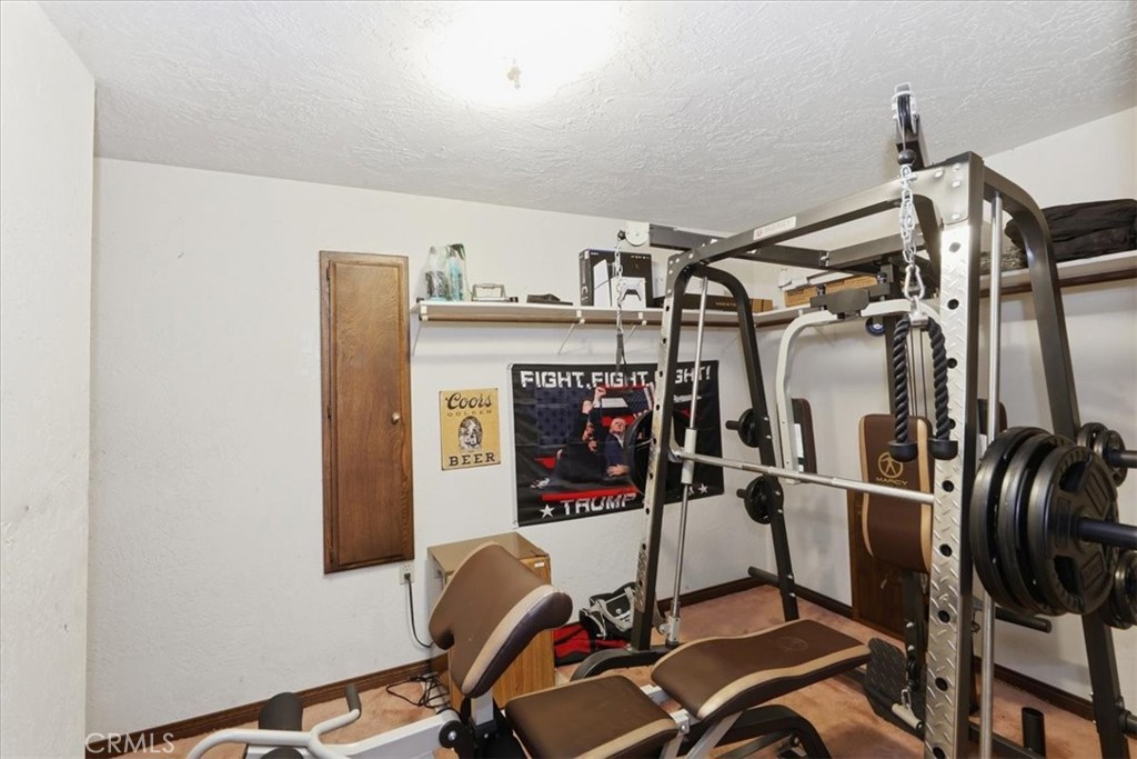 17394 Sunset View Drive Riverside, CA 92504 - Photo 38 of 62 Closet in Primary bedroom converted to gym