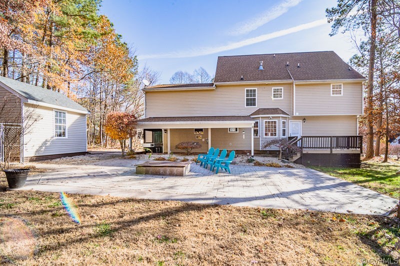 20006 Ivan Road Petersburg, VA 23803 - Photo 3 of 38 a front view of house with yard outdoor seating and barbeque oven