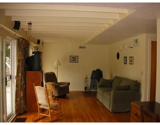 236 Worcester Road Princeton, MA 01541 - Photo 7 of 14 a living room with furniture and a flat screen tv