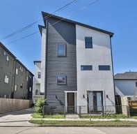 611 Sydnor Street Houston, TX 77020 - Photo 3 of 26 a front view of a house with garden