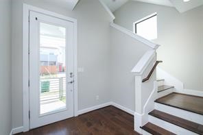 611 Sydnor Street Houston, TX 77020 - Photo 5 of 26 a view of entryway and hall with wooden floor