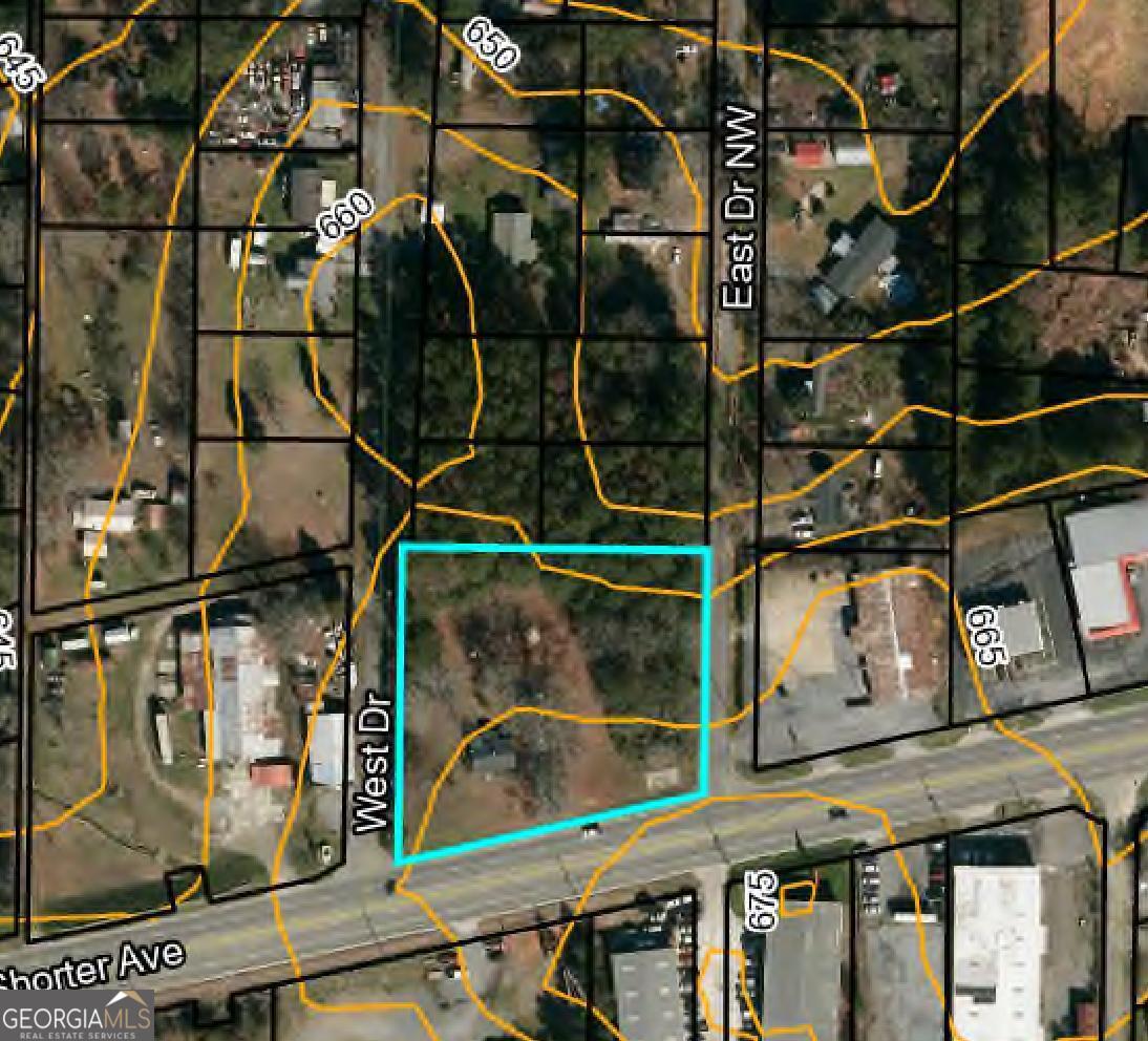 2604 Shorter Avenue Northwest Rome, GA 30165 - Photo 5 of 9 a view of a building with a street