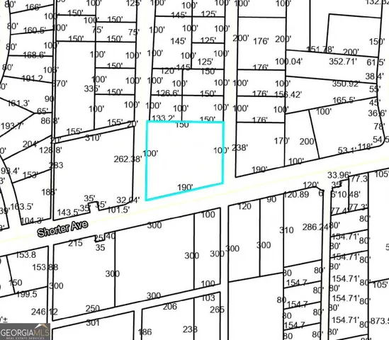 a view of a road with a building in the background