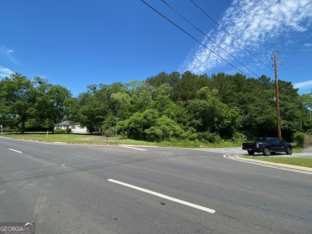 2604 Shorter Avenue Northwest Rome, GA 30165 - Photo 7 of 9 a view of a road with a building in the background