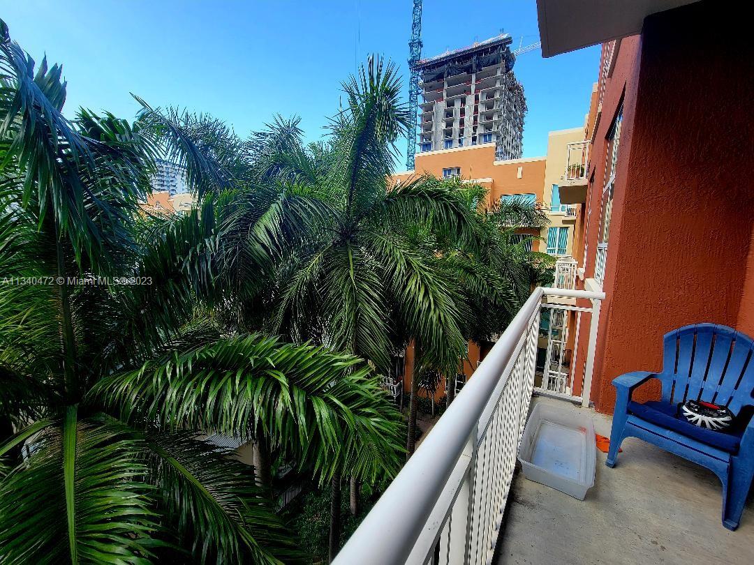 2001 Biscayne Boulevard, Unit 2505 Miami, FL 33137 - Photo 11 of 18 a view of balcony with outdoor seating and plants
