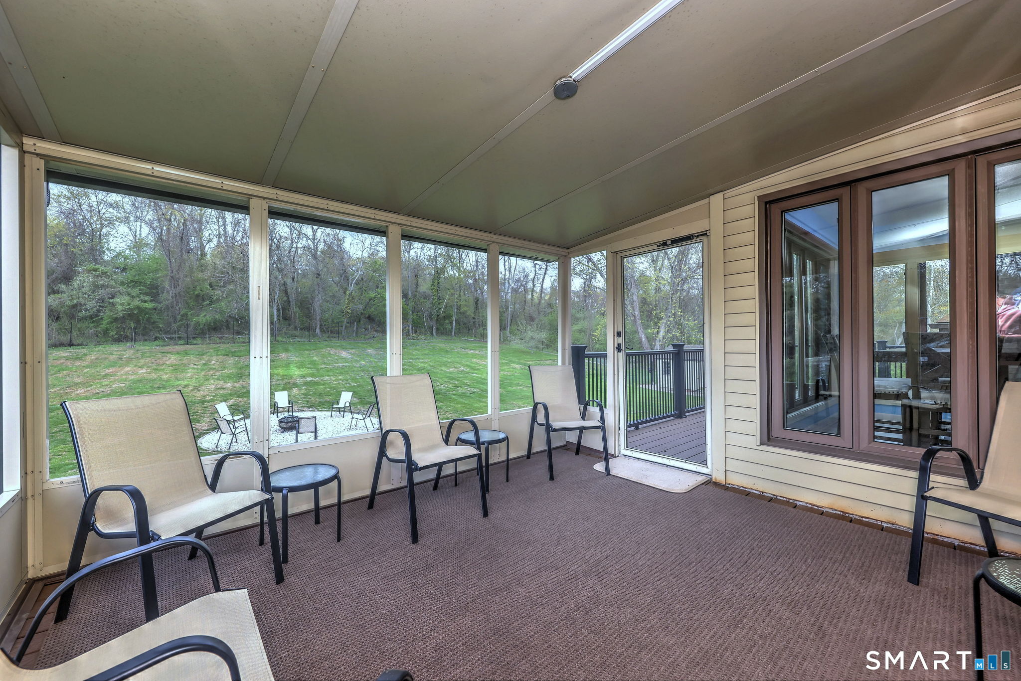 2262 Ridge Road North Haven, CT 06473 - Photo 28 of 40 a living room with furniture and a floor to ceiling window