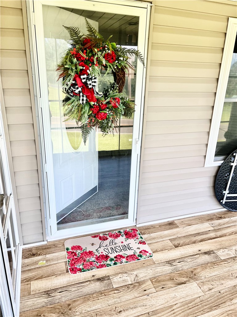 1549 Greenfield Road Westminster, SC 29693 - Photo 36 of 49 A welcoming front entry, adorned with decorative elements, invites you into this charming home.